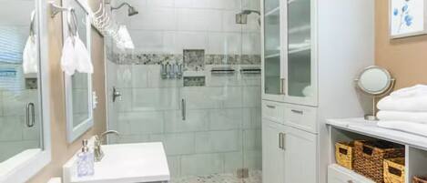 Shower, hair dryer, towels, soap