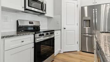 Townhome, 3 Bedrooms | Private kitchen | Fridge, oven, coffee/tea maker
