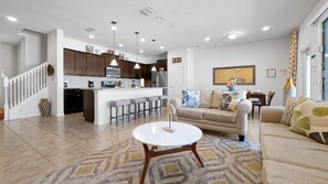 Living area - Magical Getaway Near Disney Private Pool + Resort Access, Bbq Grill! 4 Bedroom Townhouse (Kissimmee)