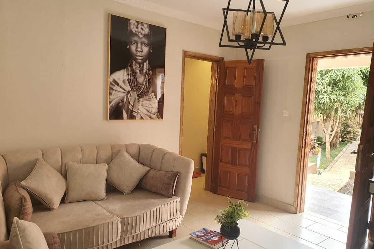 Suite superior, vista al río | Área de sala de estar