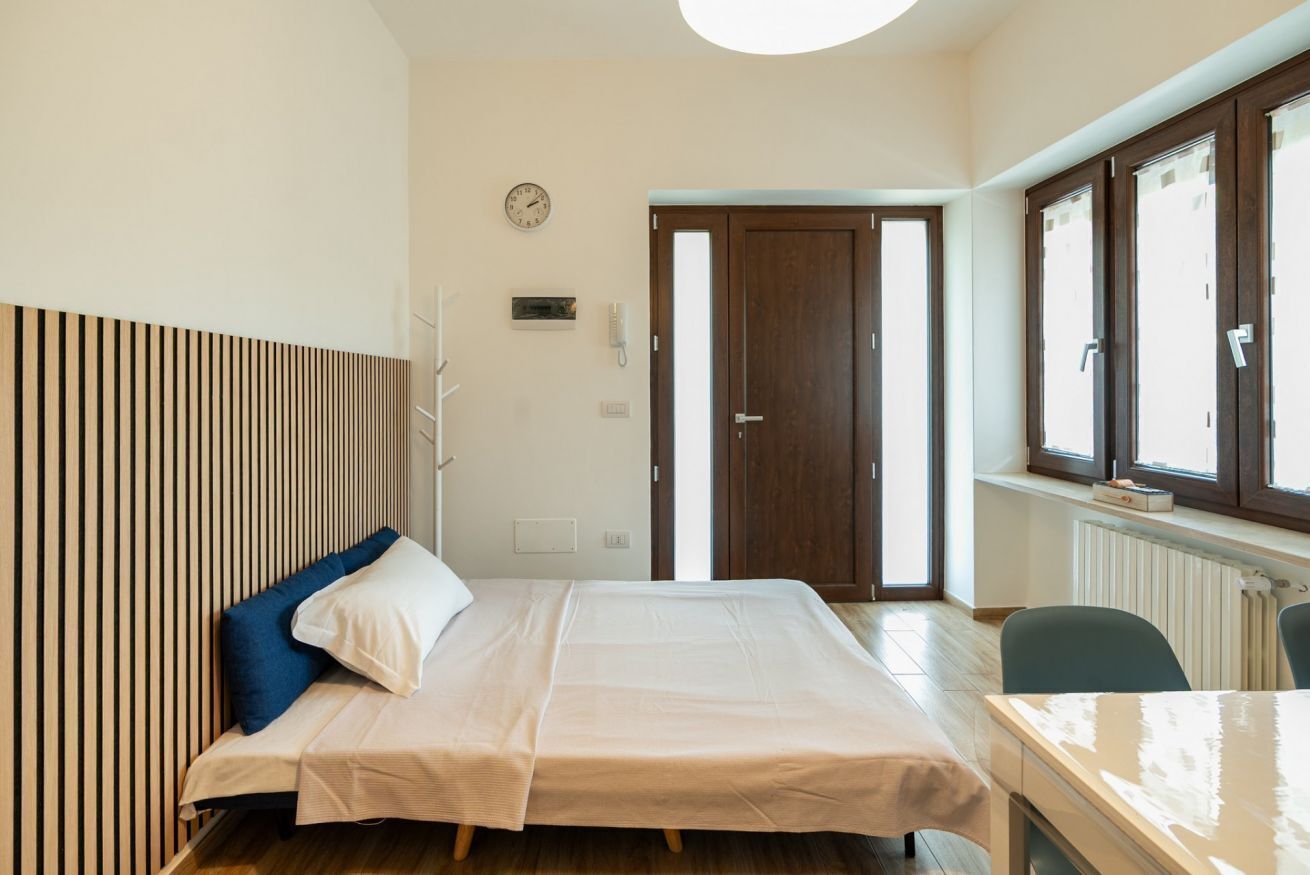 1 slaapkamer, een strijkplank/strijkijzer