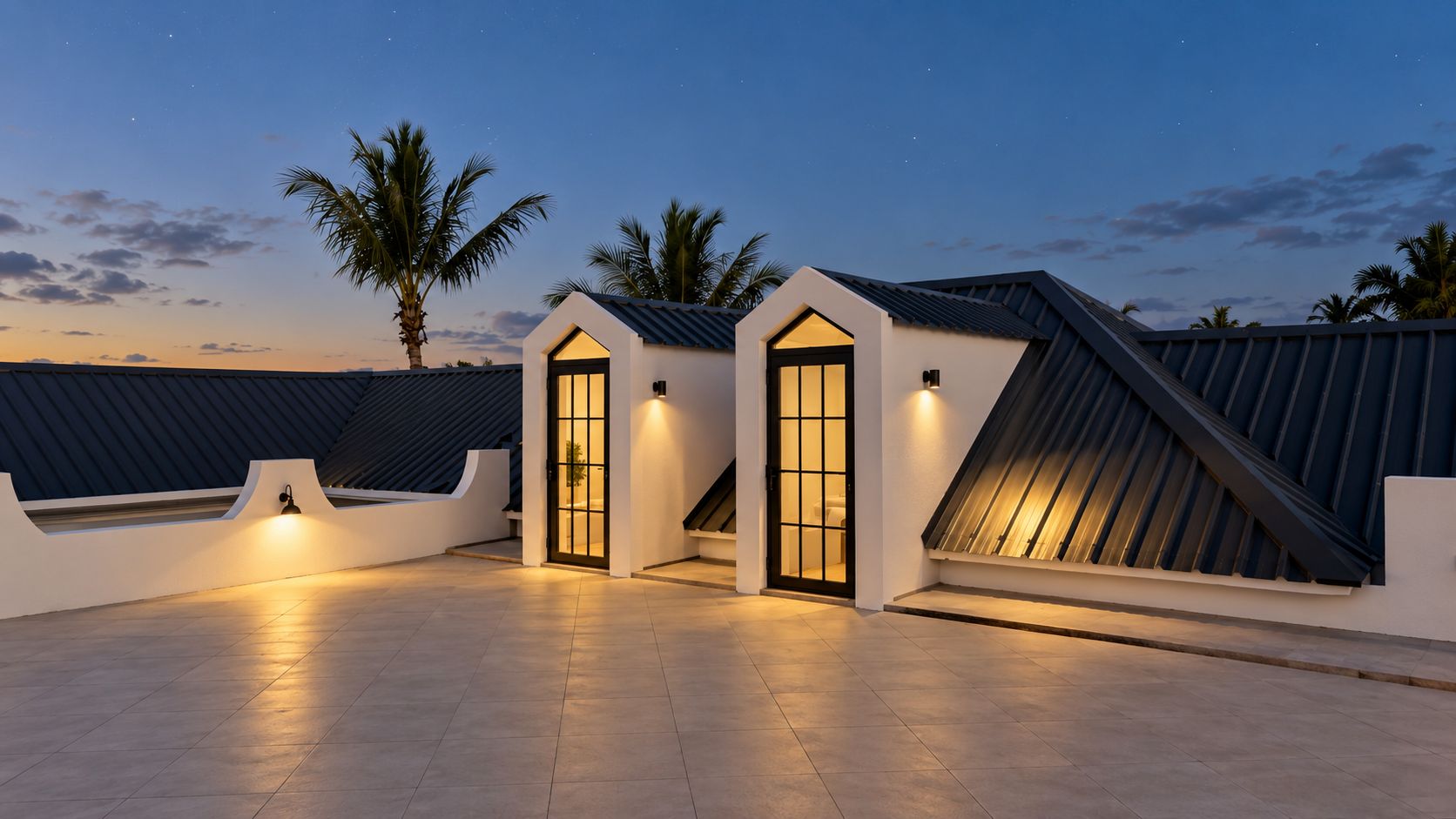 A modern rooftop terrace with two distinct sections, each with a door and a small light fixture.
