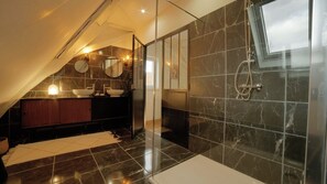 Shower, hair dryer, towels, toilet paper
