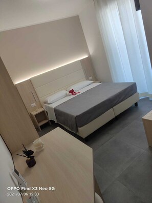 Family Quadruple Room, Balcony | In-room safe, blackout drapes, free WiFi