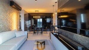 Basic Apartment | Living area - Stay in a Building With a Pool, Gym, and Leisure - SSL (Florianópolis)