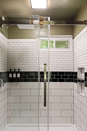 Shower, towels - Streamside | Nature-Lux w/ Hot Tub, Sauna, Firepit, Game Area, Beautiful Setting (Traverse City)