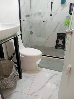 Shower, towels, soap, shampoo