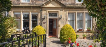 A spacious, imposing, elegant Victorian property with unbeatable sea and golf views