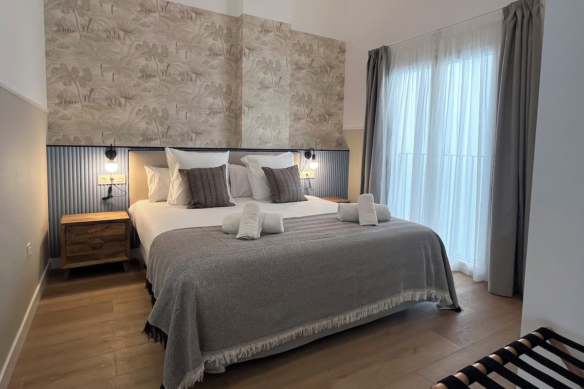Appartement, 2 chambres | Coffres-forts dans les chambres, fer et planche à repasser