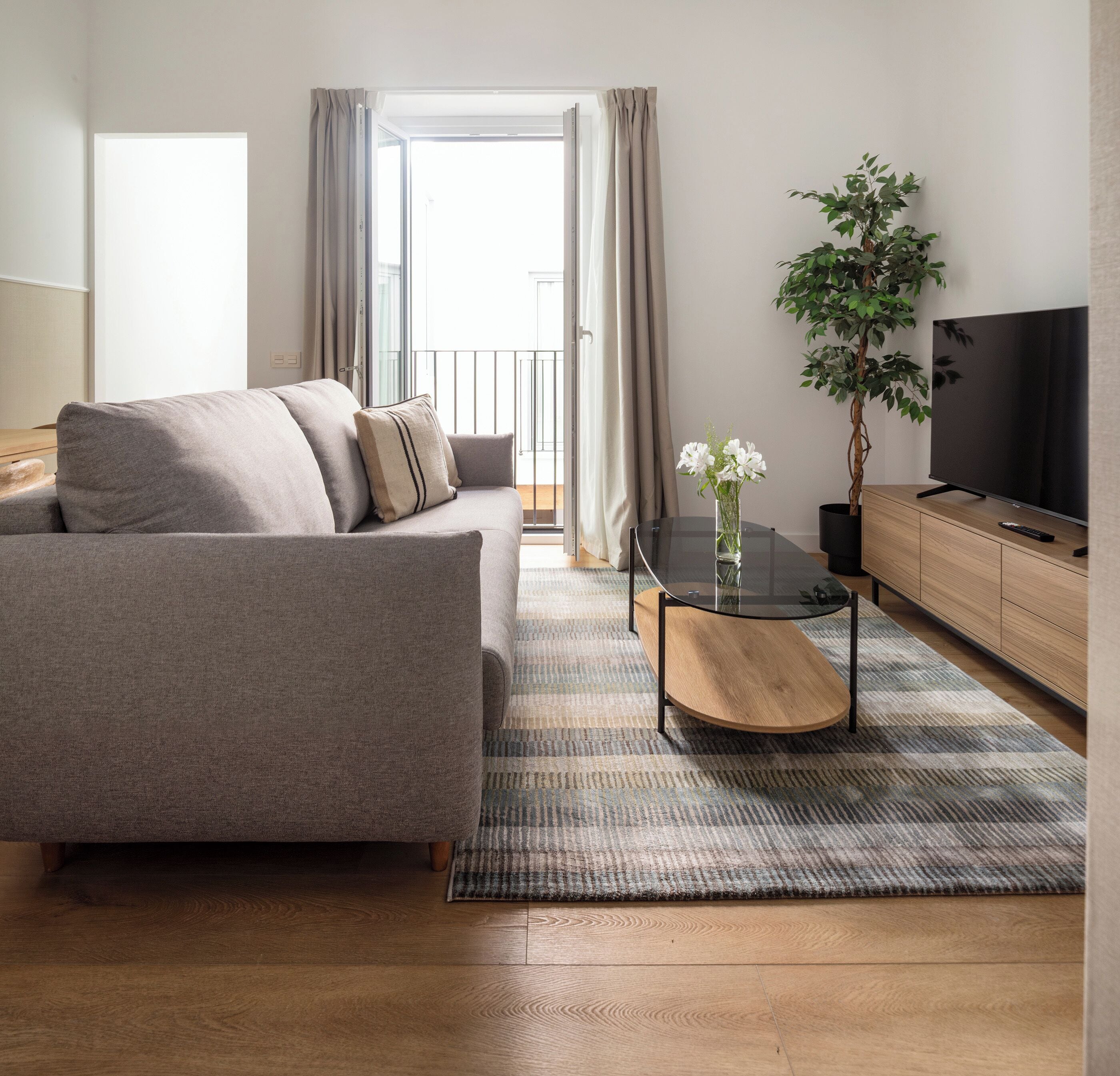 Apartment, 1 Bedroom | Living area | 28-inch flat-screen TV with cable channels