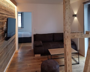 Apartamento, 1 quarto, para não fumantes, sacada | Área de estar