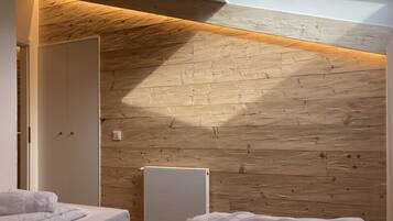 Sistema de insonorización y tabla de planchar con plancha