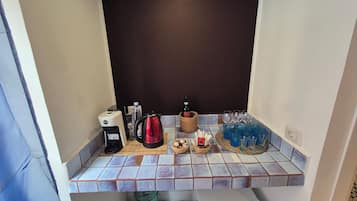 Deluxe Triple Room, City View | Living area | 33-inch Smart TV with digital channels