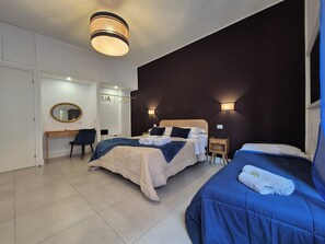 Deluxe-værelse til 3 personer - byudsigt | Allergivenligt sengetøj, senge med madrasser af memory foam