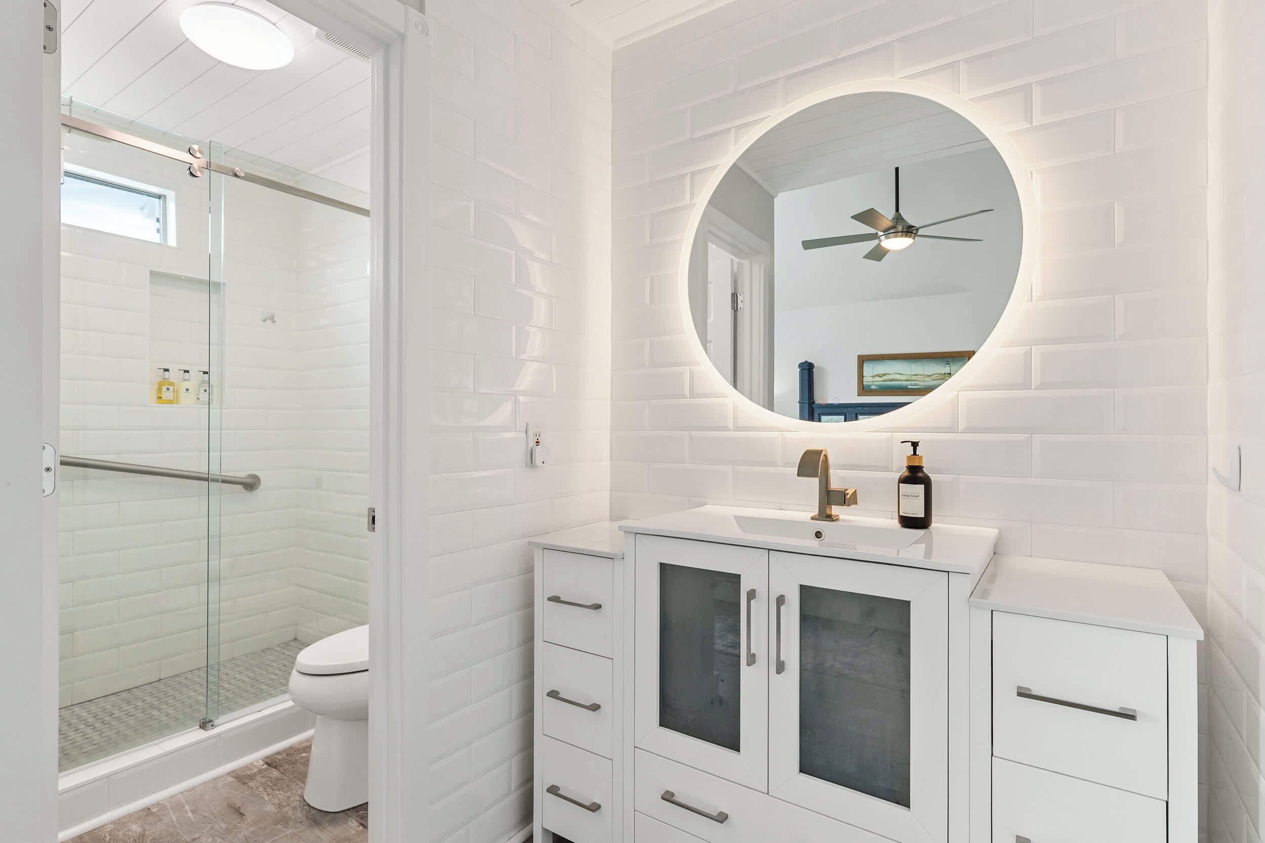 Shower, hair dryer, towels, shampoo