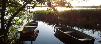 2P vacation home at the bathing lake with fishing boat near Schwerin - Mecklenburgerin