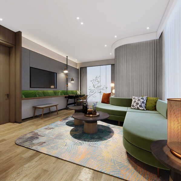 Phòng Suite Superior, 1 giường cỡ king | Khu phòng khách | TV LED 55-inch có truyền hình cáp 