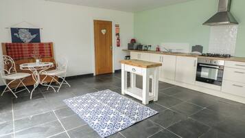 Fridge, microwave, toaster, cookware/dishes/utensils