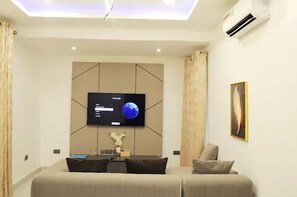 Superior Apartment, Balcony, City View | Living area - Exquisite Apartments By Signature (Abuja)