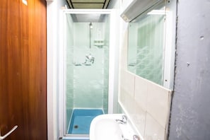 Shower, towels, soap, shampoo