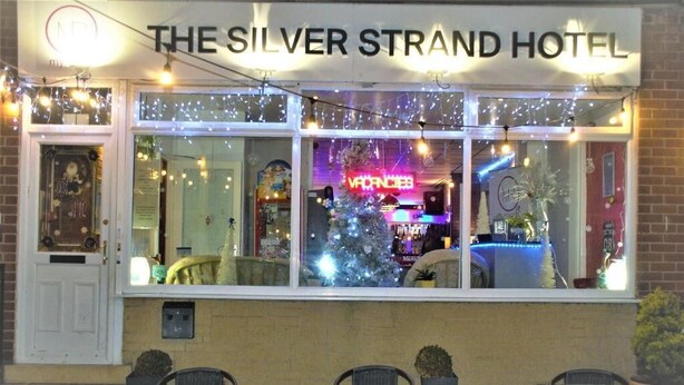 The Silver Strand Hotel with a Christmas tree and neon sign. - MyRoomz Silver Strand Hotel (Blackpool)