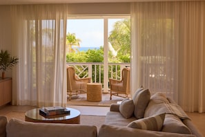 House, Multiple Beds, Pool Access, Ocean View (Brett's Home) | Living area | 40-inch TV with digital channels