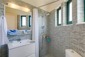 Hair dryer, towels, soap, toilet paper