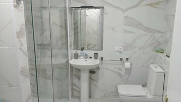 Hair dryer, towels, soap, toilet paper
