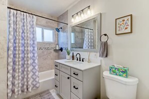 Hair dryer, towels, soap, shampoo