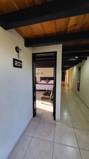 Superior Room, Patio, City View | Desk, laptop workspace, blackout curtains, iron/ironing board