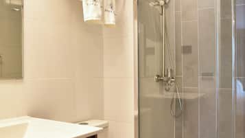 Shower, towels, toilet paper