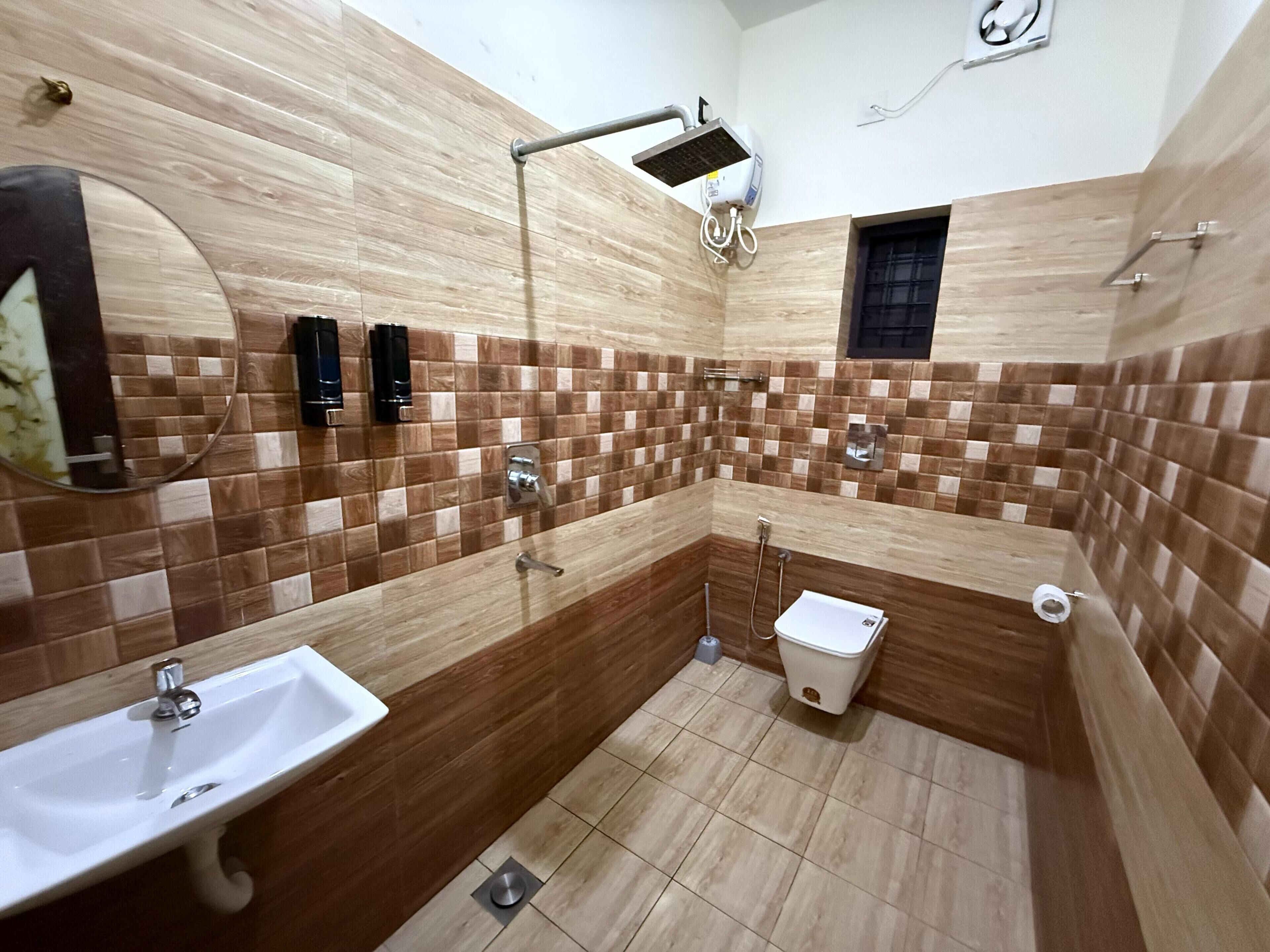 Shower, towels, soap, toilet paper