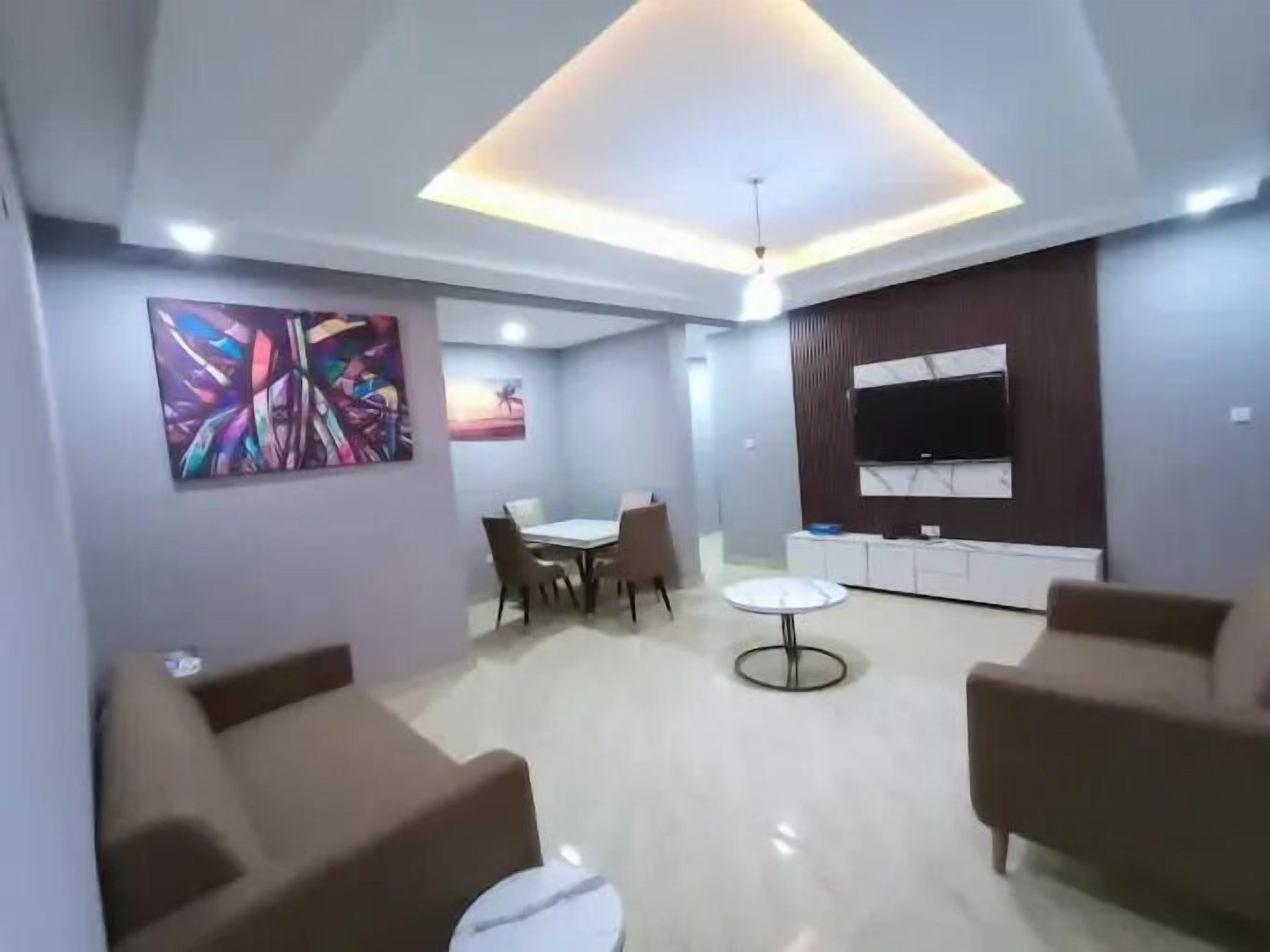 Deluxe Room, Balcony, City View | Living area