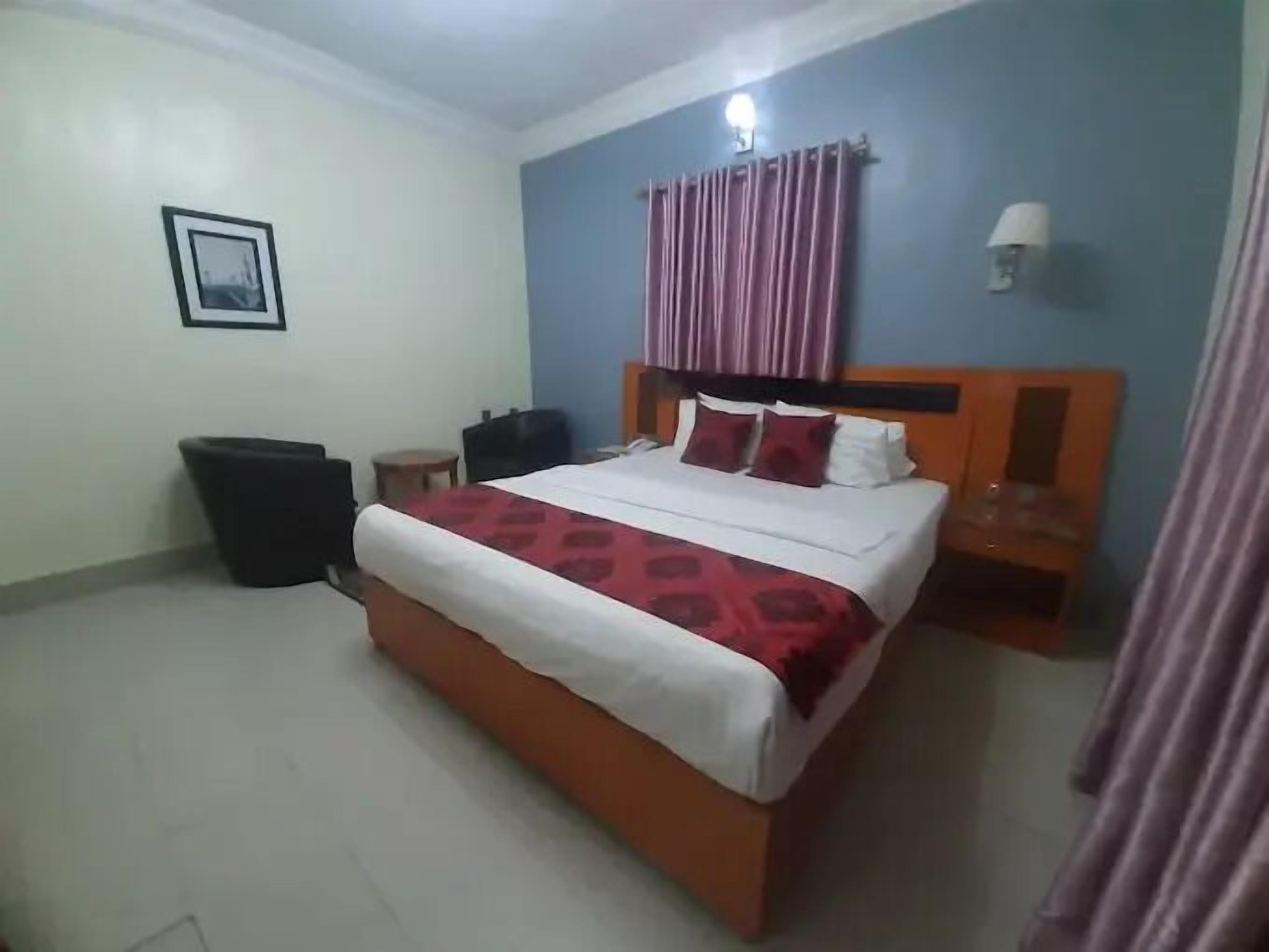 Deluxe Room, Balcony, City View | Desk, laptop workspace, blackout drapes, soundproofing
