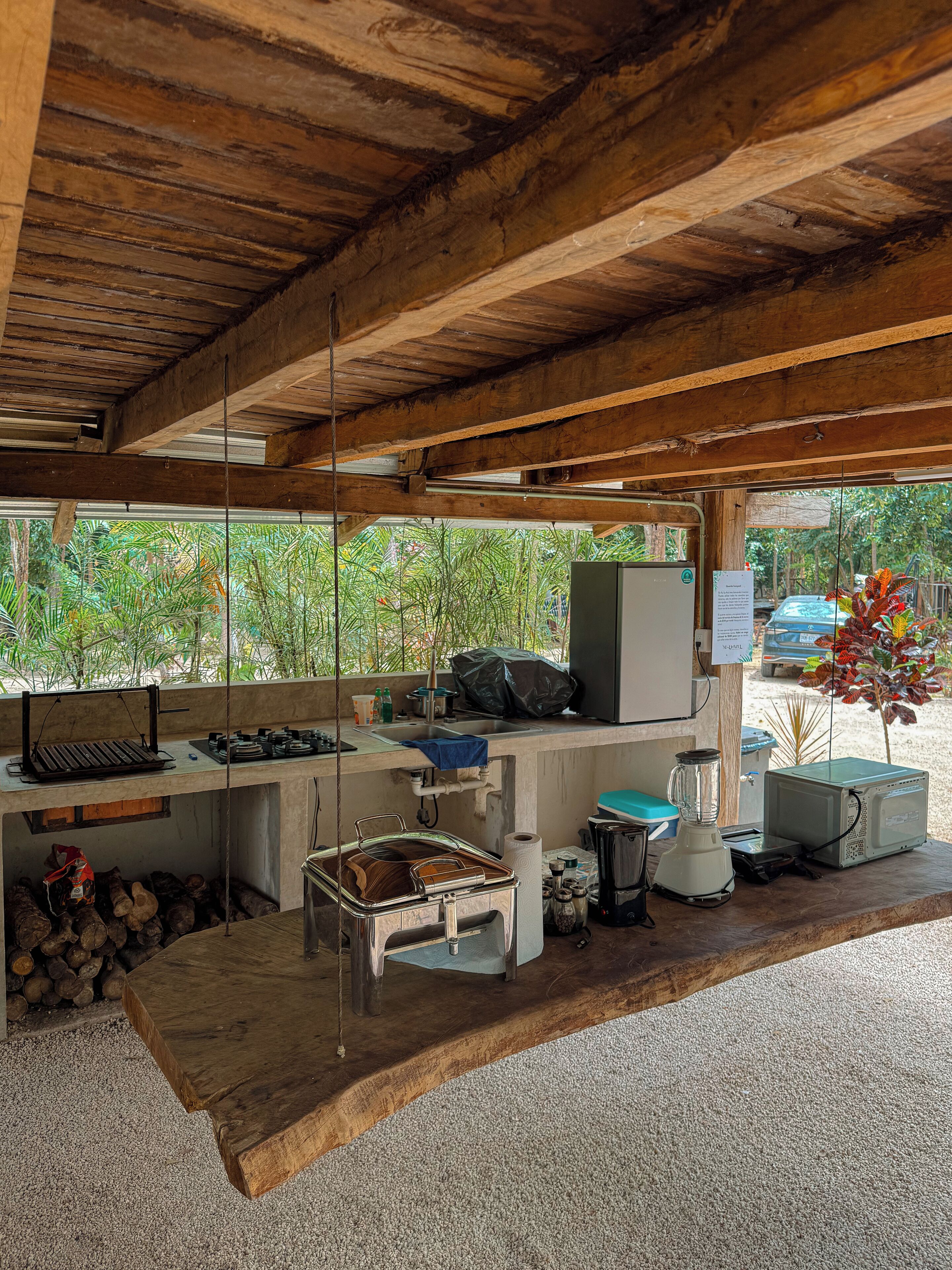 Cabin, partial lagoon view | Private kitchen | Cookware/dishes/utensils