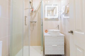 Shower, hair dryer, shampoo