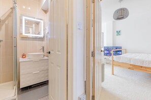 Shower, hair dryer, shampoo