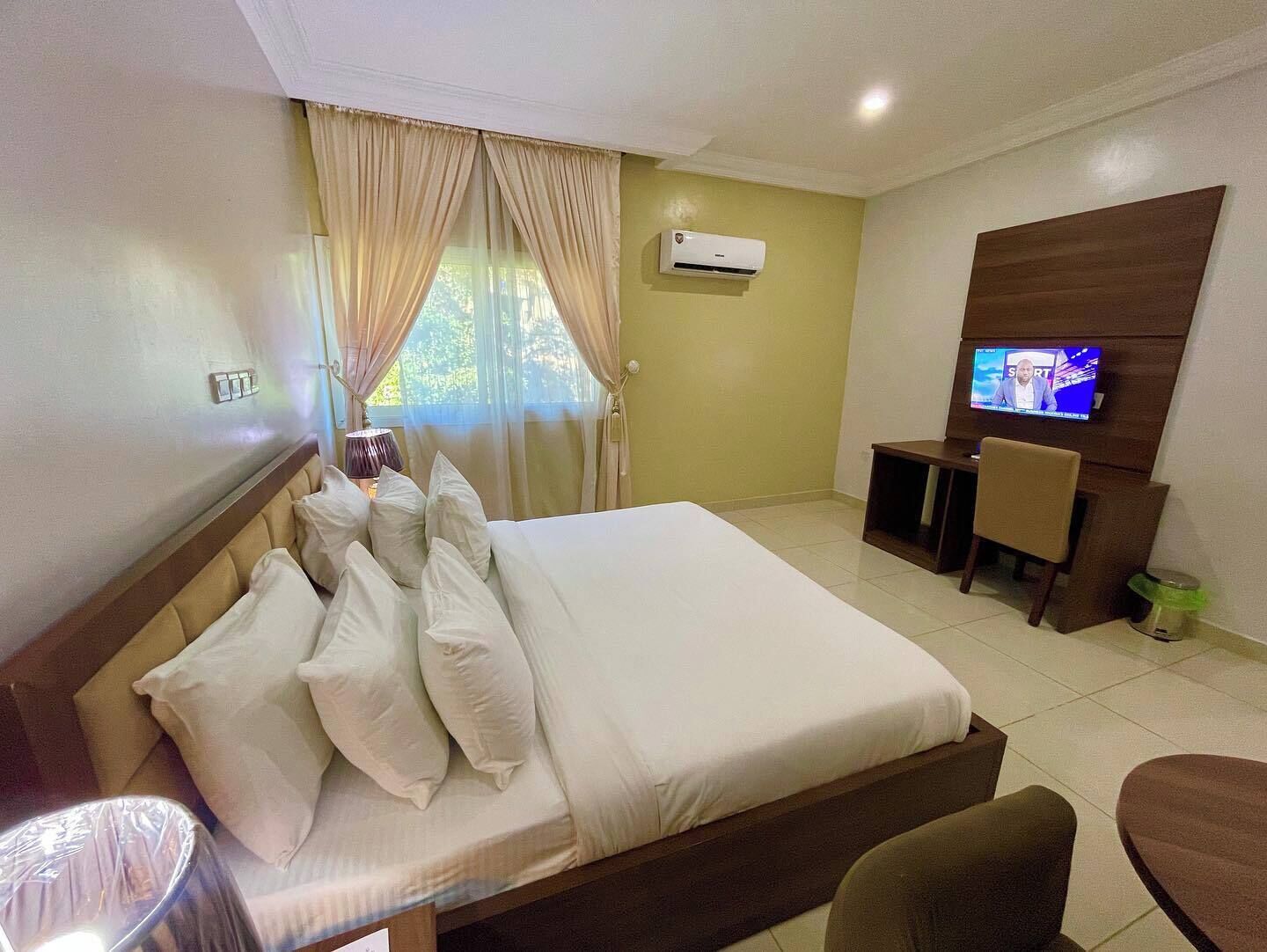 Economy Room, Balcony, City View | Desk, laptop workspace, blackout drapes, soundproofing