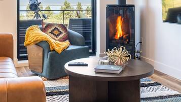 Smart TV, fireplace, foosball, books