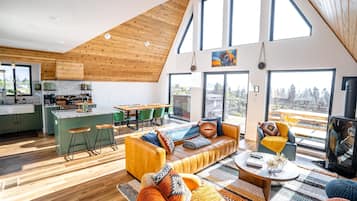 Smart TV, fireplace, foosball, books
