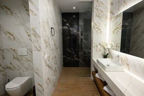 Hair dryer, towels, soap, shampoo