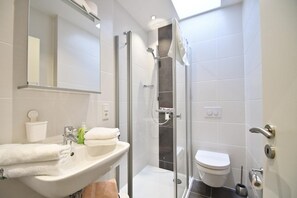 Regadera y secadora de cabello 