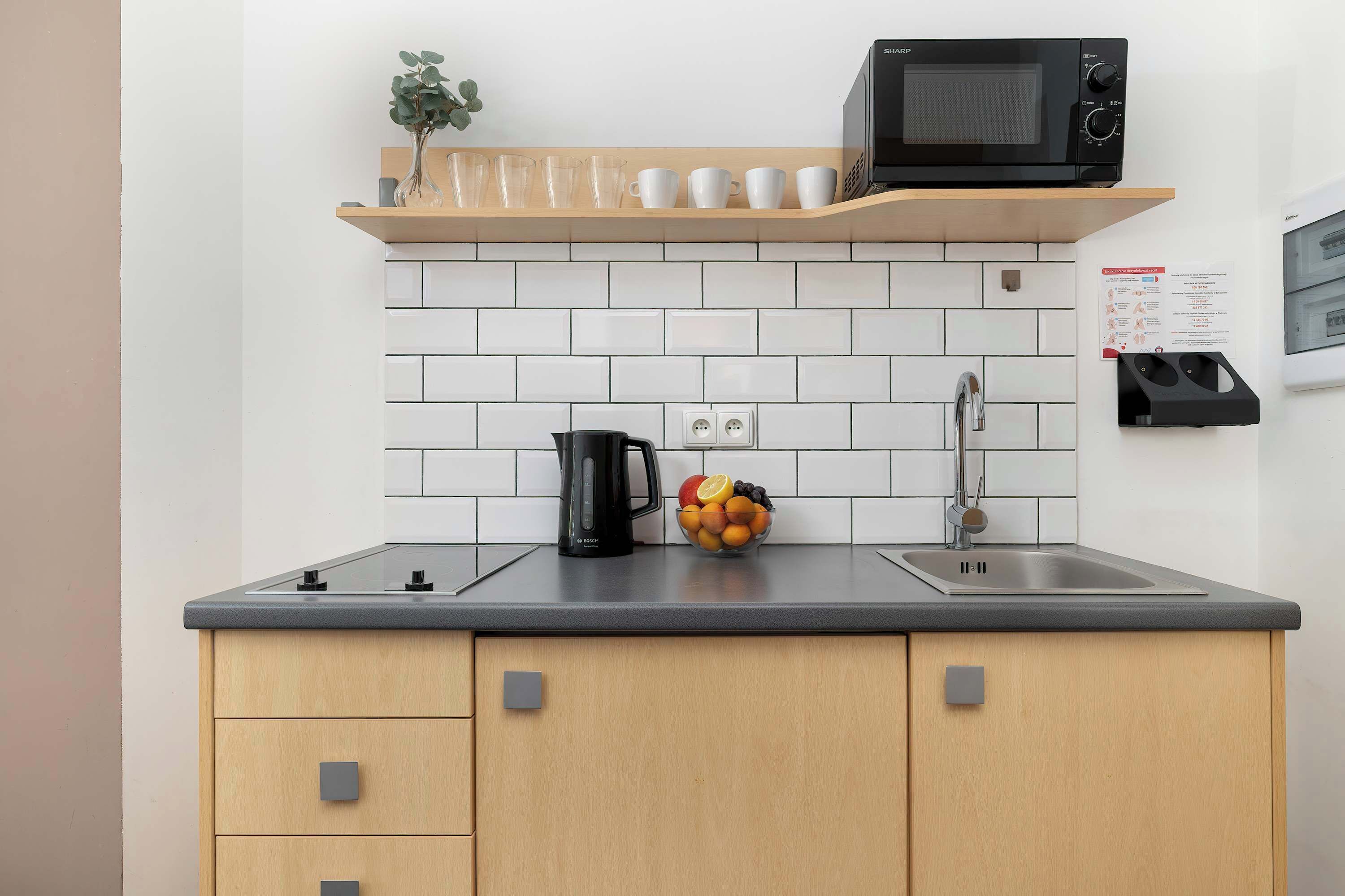 Fridge, microwave, stovetop, cookware/dishes/utensils