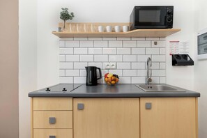 Fridge, microwave, stovetop, cookware/dishes/utensils