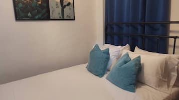 1 dormitorio, tabla de planchar con plancha, wifi