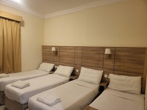 Quadruple Room, City View | Desk, laptop workspace, free WiFi