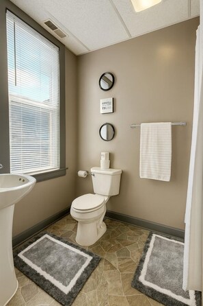 Shower, towels, soap, toilet paper