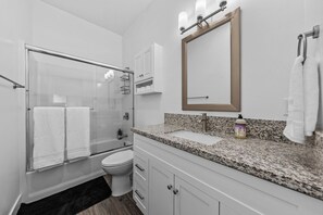 Hair dryer, towels, soap, toilet paper