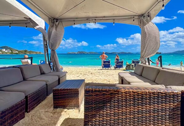 On the beach, sun loungers, beach towels