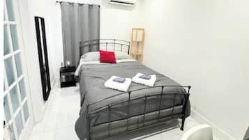 1 habitación, tabla de planchar con plancha, wifi y ropa de cama